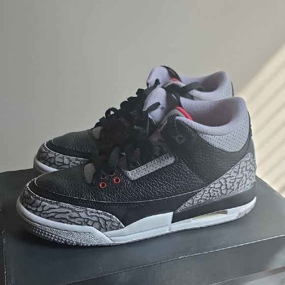 Kids black and gray Air Jordan Retro OG sneakers size 1/2 in